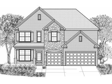 Beautiful two-story home with a brick and stone facade, a gabled roof, and a two-car garage at 7162 Linden Dr, South Fulton, GA 30349