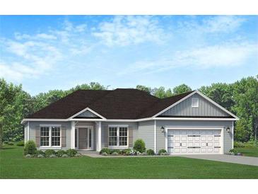 Charming single-story home featuring a two-car garage and a welcoming, landscaped front yard at 259 Eason St, Bowdon, GA 30108