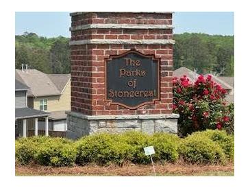 Parks of Stonecrest community sign with brick base and beautiful shrubs at 3536 Dogwood Pass, Stonecrest, GA 30038