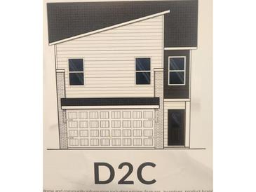 Modern two-story home showcasing clean lines and a two-car garage at 4829 Station Lane -Lot 30, Union City, GA 30349