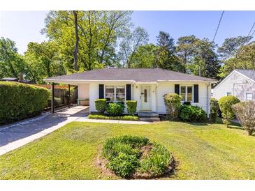 Charming single-story home with a well-manicured lawn and inviting front entrance at 1421 Smith Se St, Atlanta, GA 30316