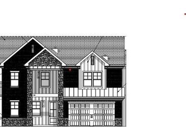 Charming two-story home displaying a harmonious blend of stone and siding accents at 267 Green Hill Road, Sandy Springs, GA 30042