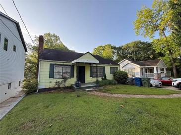 Charming one-story home with a cozy front yard and welcoming curb appeal in a serene neighborhood at 944 Stallings Se Ave, Atlanta, GA 30316