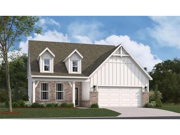Charming single-Gathering home featuring brick accents, dormer windows and an attached two-car garage at 156 Henley St, Canton, GA 30114