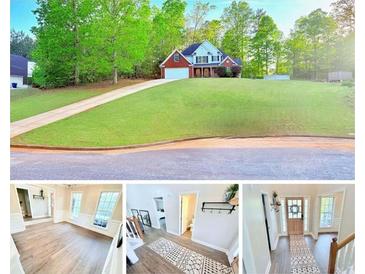 Charming two-story home with a beautifully landscaped front yard and vibrant green trees at 515 Sherwin Ct, Mcdonough, GA 30252