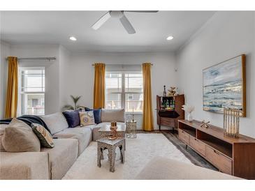 Inviting living room featuring plush seating, stylish decor, and ample natural light at 1365 Memorial Se Dr # 8, Atlanta, GA 30317