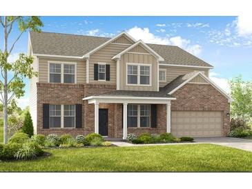 Two-story home with a brick and siding exterior, attached garage, and manicured front lawn at 5335 Trescott Path, Cumming, GA 30028