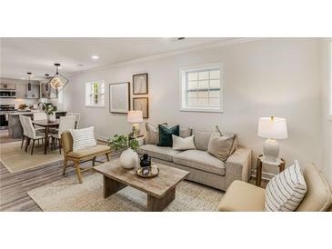 Comfortable living room with hardwood floors, neutral colors, and modern decor creates an inviting space at 1062 Grant Ter Se, Atlanta, GA 30315