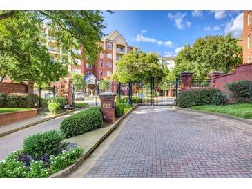 Gated entrance to condominium complex with brick and wrought iron at 211 Colonial Homes Nw Dr # 2508, Atlanta, GA 30309