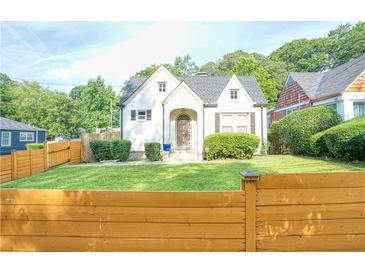 Charming home with a well-manicured lawn and inviting exterior at 98 Chappell Nw Rd, Atlanta, GA 30314