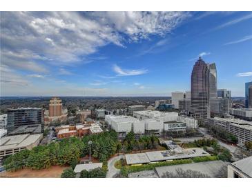 Sweeping city view featuring blue sky, trees, and a variety of building sizes and architectural styles at 1280 W Peachtree Nw St # 2801, Atlanta, GA 30309