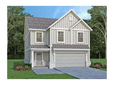 Charming two-story home with vertical siding, a gray roof, an attached two-car garage, and manicured landscaping at 1510 Gatekeeper Ter, Marietta, GA 30066