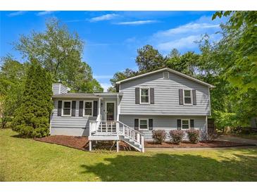 Charming two-story home with gray siding, black shutters, and a well-manicured front yard at 2994 Cathy Ann Nw Ct, Acworth, GA 30101