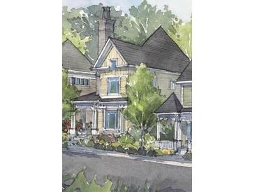 Charming home with yellow siding, black roof, inviting curb appeal, and lush landscaping at 11821 Serenbe Ln, Chattahoochee Hills, GA 30268