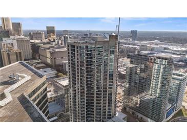 Stunning aerial view of a high-rise condo in the city with a beautiful cityscape backdrop under a clear sky at 400 W Peachtree Nw St # 3614, Atlanta, GA 30308