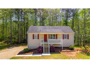 Charming single-Gathering home with inviting front porch and landscaped yard, perfect for relaxed living at 379 Villa Rosa Way, Temple, GA 30179
