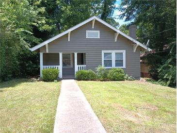 Charming single-story home with a well-maintained front yard and inviting porch at 1131 Indale Sw Pl, Atlanta, GA 30310