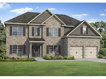 Charming two-story brick home with a well-manicured lawn and two car garage at 3293 Lions Ruby Ln, Atlanta, GA 30349