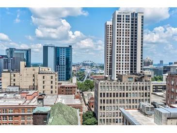 Scenic downtown Atlanta aerial view showcasing modern high-rise buildings on a sunny day at 57 Forsyth Nw St # 12B, Atlanta, GA 30303