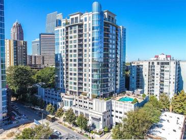 Stunning exterior shot of a high-rise condominium building with a pool and cityscape views at 222 12Th Ne St # 1806, Atlanta, GA 30309