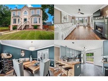 Charming two-story home with a well-manicured lawn and inviting front entrance at 2349 June Springs Sw Dr, Marietta, GA 30008