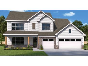Charming two-story home featuring a two-car garage, brick accents, and a welcoming front porch at 214 Wild Ginger Bend, Woodstock, GA 30188