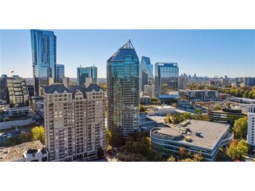 Stunning Buckhead Atlanta aerial view of modern high-rise buildings, trees, and blue skies at 3338 Peachtree Ne Rd # 3406, Atlanta, GA 30326