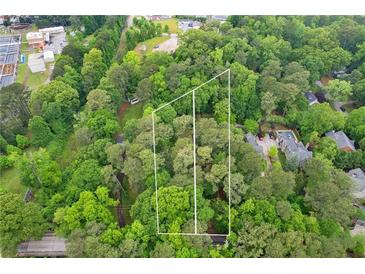 A tranquil aerial view showing boundaries of a wooded property at 1909 Moores Mill Nw Rd, Atlanta, GA 30318