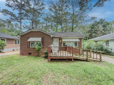 Charming brick home with a front porch and ramp access at 646 Quillian Ave, Decatur, GA 30032