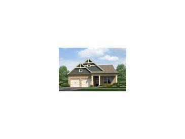 Charming single-story home with a two-car garage and inviting front porch at 121 Maplewood Ln, Conyers, GA 30094