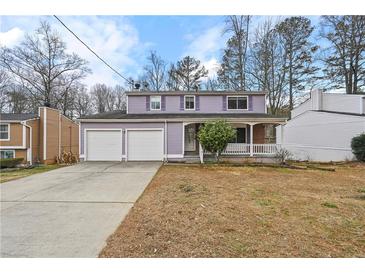 Charming two-story home with a two-car garage and covered front porch at 4608 Rosemear Ct, Norcross, GA 30093