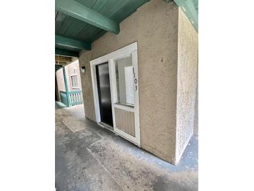 A welcoming exterior view of a home's front door, with the unit number displayed at 3575 Oakvale Rd # 1103, Decatur, GA 30034