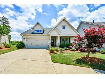 Charming home with a well-manicured front yard and a two-car garage at 422 Laurel Spring Ct, Canton, GA 30114