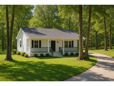 Charming single-story home featuring a cozy front porch with green railings and a well-manicured lawn at 6032 Lakeshore Se Dr, Mableton, GA 30126