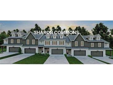Charming townhomes featuring modern design elements, private garages, and manicured lawns at 206 Sharon Ln, Loganville, GA 30052