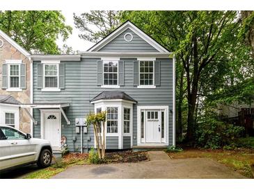 Two-story townhome with a nicely landscaped front yard and a well-maintained exterior at 3001 Majestic Park Ct, Duluth, GA 30096
