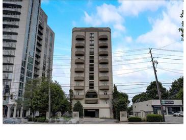 Exterior shot of building showing balconies, entrances, and surrounding buildings at 2161 Peachtree Rd # Apt 706, Atlanta, GA 30309
