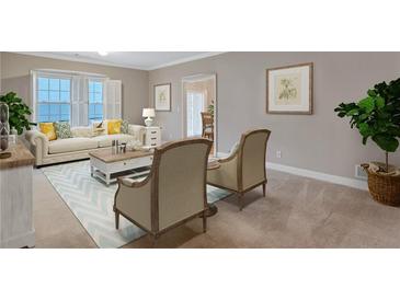 Bright living room with neutral walls, comfortable seating, and a light blue area rug at 3649 Peachtree Ne Rd # 201, Atlanta, GA 30319