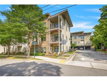 Stylish condominium complex with multiple balconies and professional landscaping at 22 Moda Ln, Atlanta, GA 30316