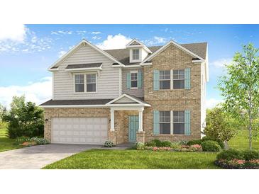 Charming two-story home with a combination of brick and siding, complemented by a landscaped yard and a two-car garage at 11 Bennett Farm Dr, Loganville, GA 30052