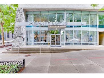 Modern building, Midcity Lofts, has large windows and a stone facade, located at 845 at 845 Spring Nw St # 127, Atlanta, GA 30308