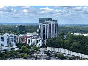 Stunning Buckhead condo features panoramic city views and lush greenery from a high-rise vantage point at 3445 Stratford Rd # 1501, Atlanta, GA 30326