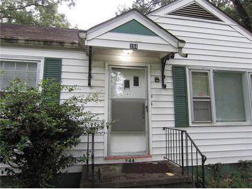 Charming front door with vintage details and a welcoming entrance to the home at 244 Hilltop Sw Dr, Atlanta, GA 30315