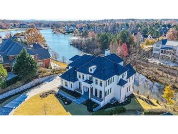 Stunning waterfront home with meticulous landscaping and a private backyard at 2837 Darlington Run, Duluth, GA 30097