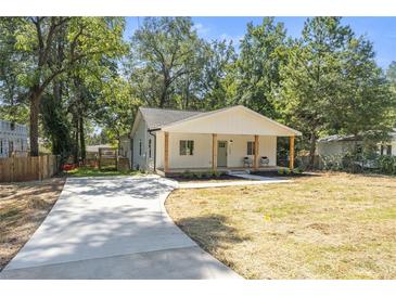 Charming, newly renovated single-story home with a welcoming front porch and manicured lawn at 1363 Diamond Se Ave, Atlanta, GA 30316