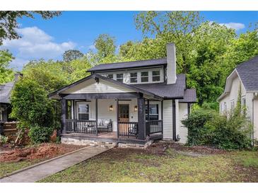 Charming renovated cottage with a welcoming front porch and craftsman details at 1227 Epworth Sw St, Atlanta, GA 30310