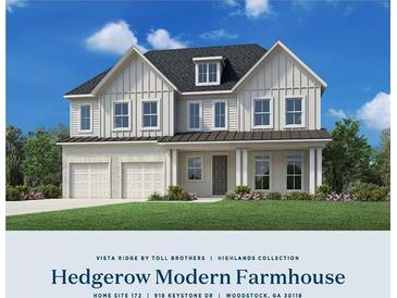 New Hedgerow Modern Farmhouse featuring a two-car garage and beautiful landscaping at 918 Keystone Dr, Woodstock, GA 30188