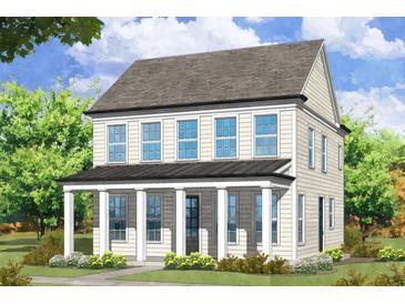Charming two-story home with a welcoming front porch and classic architectural details at 41 Hydrangea Unit 73 Ln, Auburn, GA 30011
