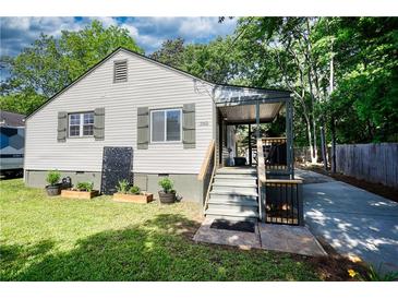 Charming single-Gathering home featuring a covered front porch and well-maintained lawn at 1149 Avondale Se Ave, Atlanta, GA 30312