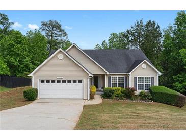 Charming single-Gathering home featuring a two-car garage and well-maintained landscaping at 4219 David Austin Ct, Snellville, GA 30039